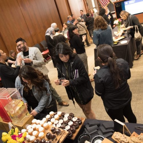 Students, faculty, staff, and guests of GWS at a year end celebration event.