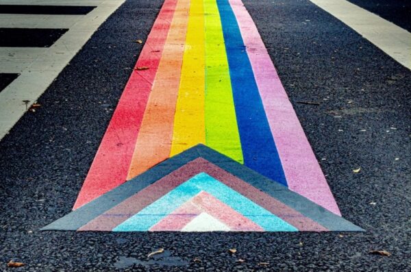 redesigned pride flag painted on street