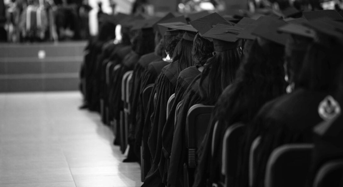 A large group of people in graduation gowns.